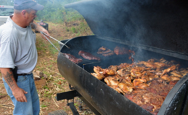 Man cooking food on a grill