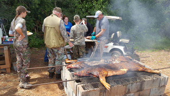 Hunters cooking a meal