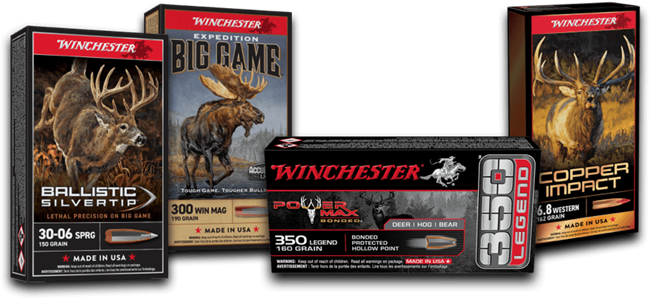 Multiple ammunition boxes of Winchester big game hunting rifle brands