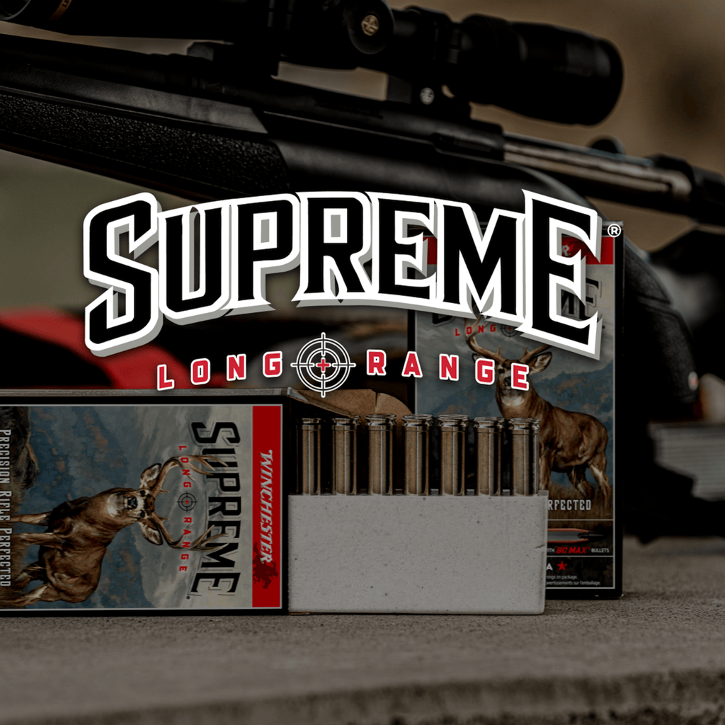 Supreme Long Range in front of ammunition boxes
